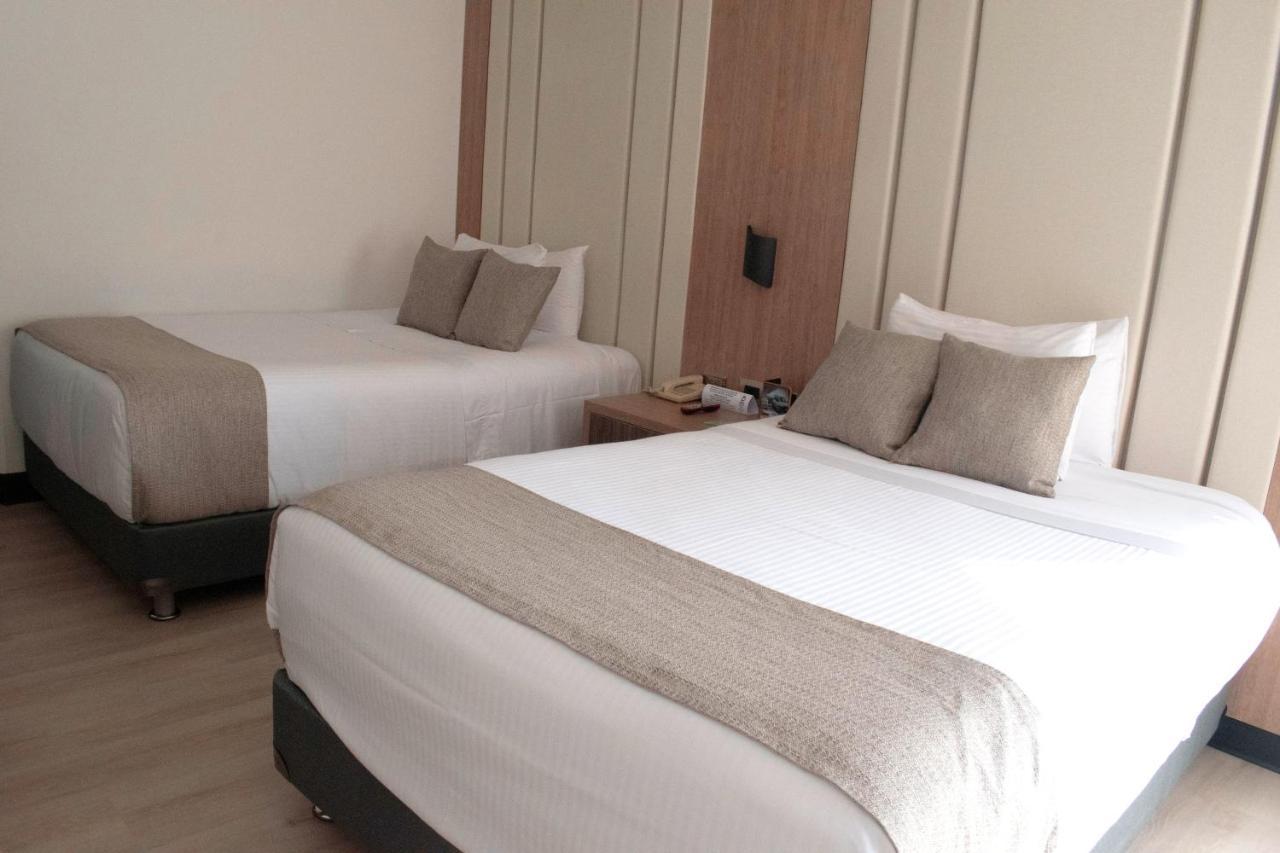 Hotel Dann Carlton Belfort Medellín Dış mekan fotoğraf A room at the hotel
