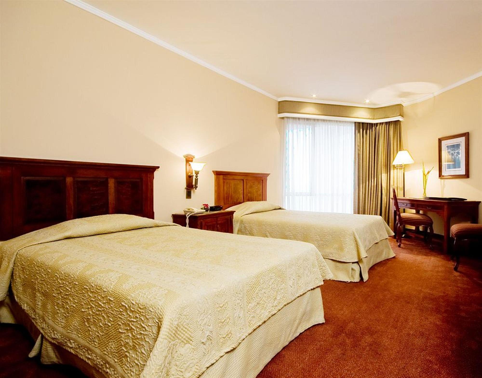 Hotel Dann Carlton Belfort Medellín Dış mekan fotoğraf A room at the hotel